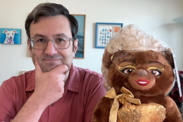 David and his limited edition RuPaul teddy bear.